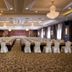 Shuguang Liting Hotel Ningbo conference hall with rows of banquet tables and chandeliers