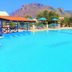 Zorbas Beach Village Hotel in Stavros with a large outdoor pool and mountain backdrop
