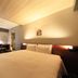 Richmond Hotel Yokohama-Bashamichi room with king bed, desk, sofa and TV in Yokohama