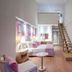 Royal Teos Thermal Resort Clinic & Spa in Seferihisar: loft-style suite with staircase and pink-accented bed