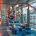 W Sydney lounge with colorful seating and city views in Sydney