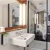 Campanile Nature - Mont De Marsan bathroom with wall-mounted sink, mirror, shower and black-and-white mural