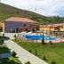 Best Western Bohemian Resort in Sevan with outdoor pool, loungers, and hillside setting