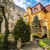 Aphrodite Hotel Marianske Lazne exterior in Mariánské Lázně with yellow facade and landscaped garden