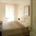 Affittacamere Da Cesare in Monterosso al Mare bedroom with double bed, chair, and bright window