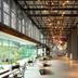 Tokyo Bay Shiomi Prince Hotel lobby with dramatic ceiling lights, seating, and mural in Tokyo