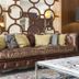 Hotel Dom Goncalo & Spa in Fátima lobby with leather sofa, patterned screen, and coffee table