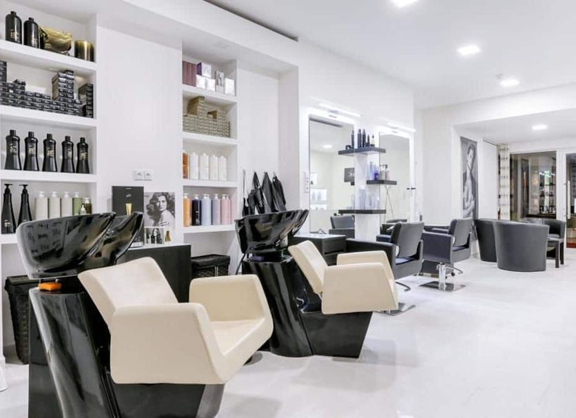 Hotel Globus Prague salon with styling chairs, wash basins, and bright modern interior