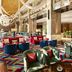 JW Marriott Hotel New Delhi Aerocity lobby with colorful seating, marble floors, and modern lounge area