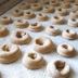 Agriturismo Vivinatura in Gallipoli: rows of ring-shaped pastries dusted with flour on a tray