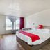 OYO Hotel Waco University Area/ I-35 guest room with king bed and balcony view in Waco
