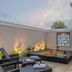 Vijayshree Resort, Hampi courtyard with a raised outdoor soaking pool and lantern-lit seating area in Hosapete