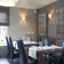 Dining room at B&B Brasserie Lakerhof in Ohe en Laak with set tables and upholstered wall panels