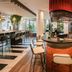 Ibis Styles Wien City bar and lounge area in Vienna with seating and counter