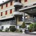 Hotel il Focolare in Fabro, exterior entrance with stairs, balconies and potted plants