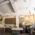 The Packer Lodge Yogyakarta common kitchen and lounge area in Yogyakarta with counters and dining tables