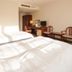 Fukuyama Terminal Hotel in Fukuyama guest room with twin beds, desk, chair and TV