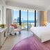 Marriott Vacation Club at Surfers Paradise room with ocean and skyline view, king bed and chair