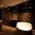 Lee Design Hotel, Yongin: modern bathroom with freestanding tub, glass shower, and wall-mounted sink