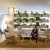 Novotel Frankfurt City lobby lounge with seating, work area and indoor plant wall in Frankfurt am Main