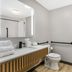 Best Western Plus Rose City Conference Center Inn bathroom in Thomasville with vanity, mirror, toilet and grab bar