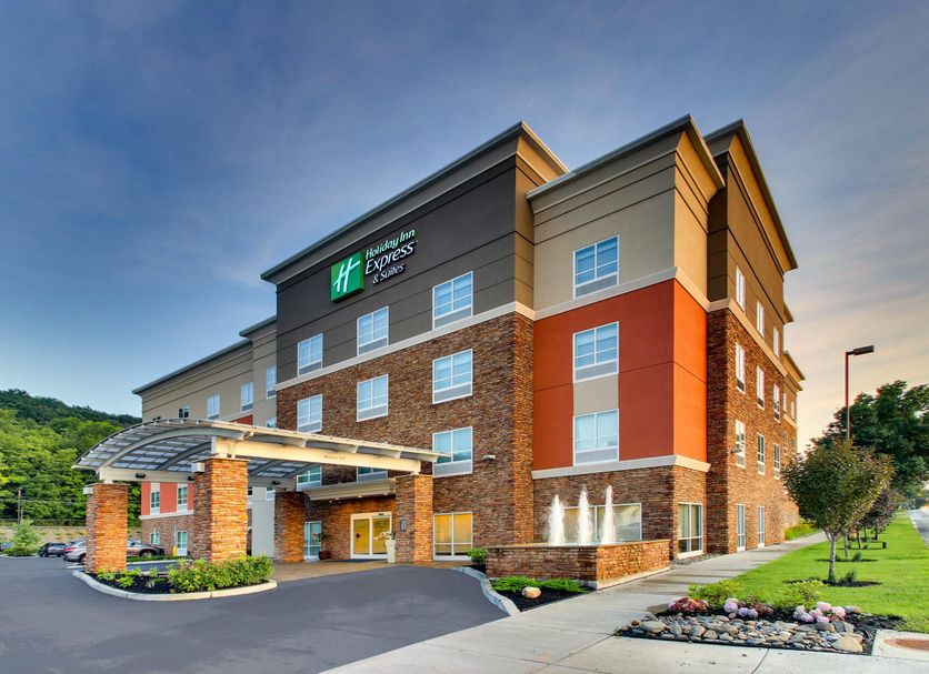 Holiday Inn Express & Suites Ithaca by IHG exterior with covered entrance and landscaped driveway