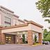Four Points by Sheraton Nashville Airport exterior with covered entrance and trees in Nashville