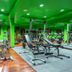 Khaolak Laguna Resort gym in Khao Lak with weight machines, benches and mirrors