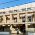Oakhostel Zen hotel exterior in Tokyo with beige facade and entrance