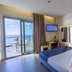 Smy Aran Blu Roma Mare in Lido di Ostia with sea-view balcony and modern bedroom