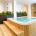 Indoor spa pool at Eix Alcudia Hotel +18 in Alcúdia with wooden seating and sauna