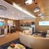Jpark Island Resort & Waterpark lobby in Lapu-Lapu City with curved sofa, reception desks and pendant lights