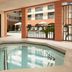 Courtyard by Marriott Scottsdale Old Town indoor hot tub beside an outdoor pool and courtyard