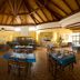 hu I Pini village in Fiano Romano dining room with wooden vaulted ceiling and many set tables