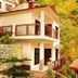 Ganga Beach Resort in Rishikesh, hillside hotel with balconies among lush trees