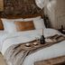 Mother Goose Hotel Utrecht bedroom with bed, champagne tray, and heart-shaped balloons