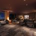 Sanso Kaze No Mori in Minoh lounge with city night view, lounge seating and warm fireplace