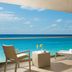 Breathless Riviera Cancun Resort & Spa balcony with ocean view, lounge chair and table in Puerto Morelos