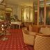 Grand Hotel La Pace Sorrento elegant lounge with bar, piano, and upholstered seating