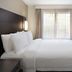 Residence Inn by Marriott Albany East Greenbush/Tech Valley guest room with king bed and TV