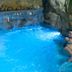 Park Hotel Tyrrenian in Amantea: indoor grotto pool with waterfall and rocky walls