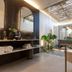 Soulshine Bali Ubud spa area with double sinks, folded towels, plants and a shower behind glass