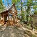 Glamping Village Orlando in Chianti, Cavriglia: wooden glamping cabin among trees with ladder and porch