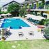 Michelangelo Boutique Hotel Dalyan in Ortaca, outdoor pool with loungers and umbrellas in a courtyard