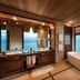 Conrad Bora Bora Nui in Vaitape: bathroom with freestanding tub and ocean view