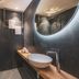 Hotel de Sterrenberg - Adults Only bathroom in Otterlo with walk-in shower, vessel sink and round mirror