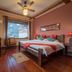 Yangshuo Mountain Nest Boutique Hotel in Guilin room with balcony mountain view, king bed and desk