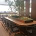 Tosei Hotel Cocone Ueno in Tokyo rooftop terrace with long communal table, chairs, and city views