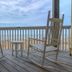 The Inn on Pamlico Sound in Buxton: rocking chairs on a balcony overlooking Pamlico Sound