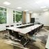 Bildungshaus St Bernhard meeting room in Rastatt with U-shaped conference table and large windows
